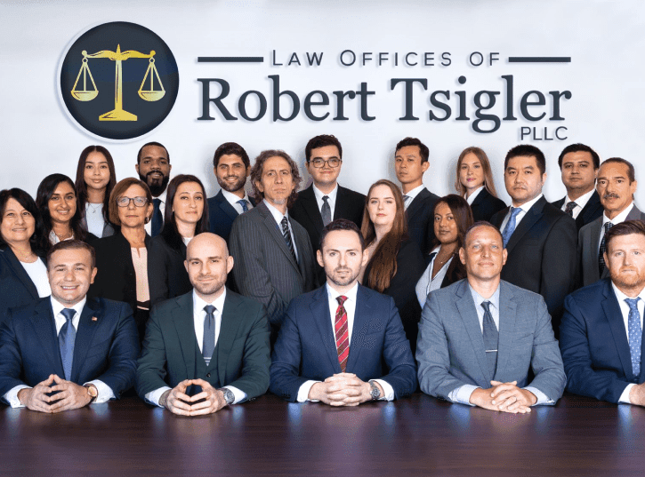 Tsigler Law Staff Group Photo with Logo